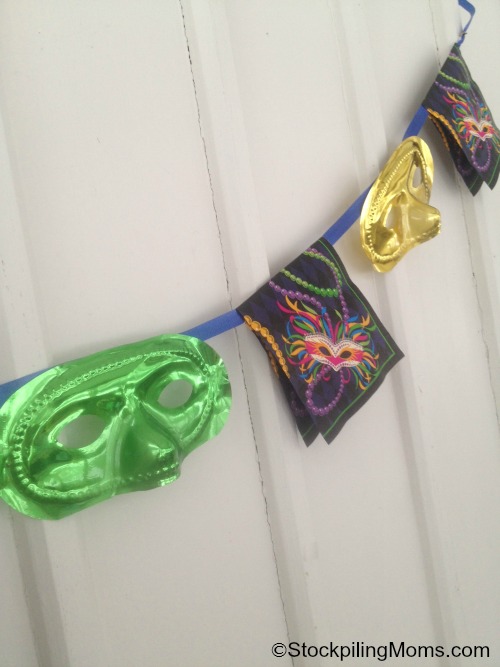 Mardi Gras Party Banner - Love this easy to make decoration that costs only $2 to create!