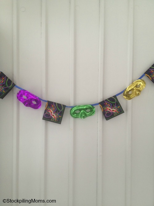 Mardi Gras Party Banner - Love this easy to make decoration that costs only $2 to create!